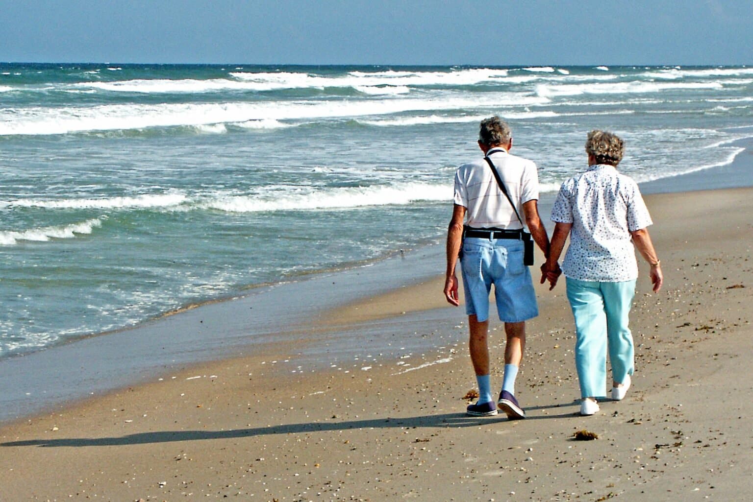 Couple walking on a beach
